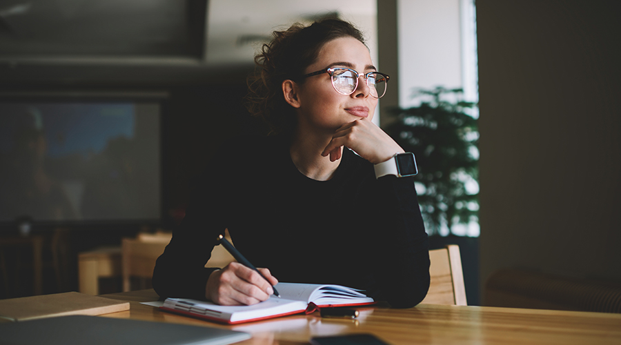 photo of a woman writing