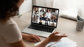 Photo of woman partaking in an online meeting